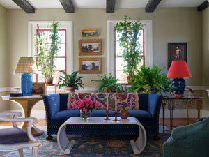 Emilia Coffee Table by Bunny Williams Home in front of a sofa in a living room