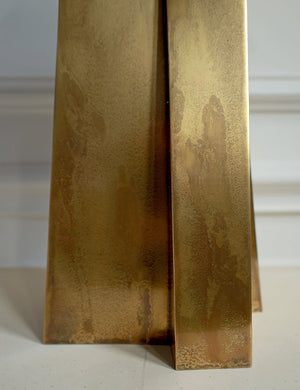 Close-up of a textured gold object on a white background