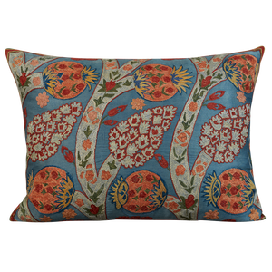 Rectangular silk suzani cushion with pomegranate and vine design on blue ground