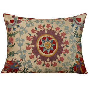 Rectangular silk suzani cushion with scrolling floral design with purple silk back