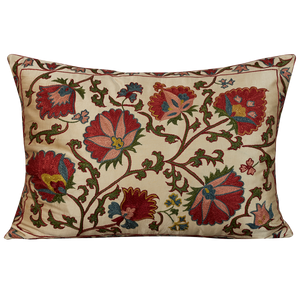 Rectangular silk suzani cushion with all over floral design on cream ground