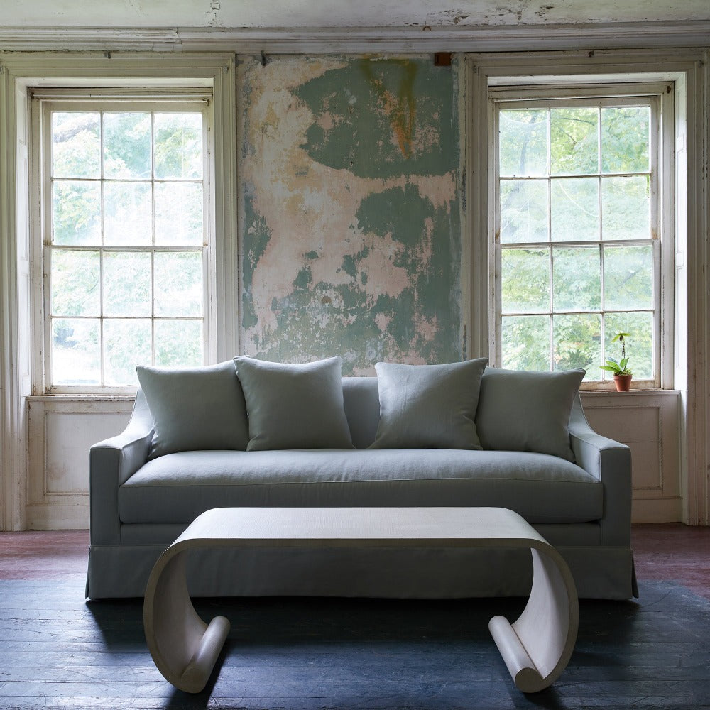 Emilia Coffee Table by Bunny Williams Home in front of a sofa