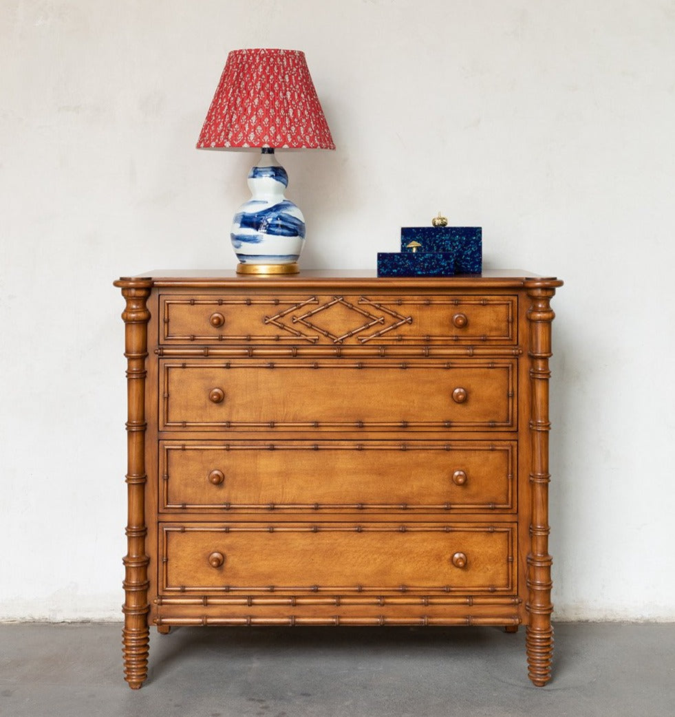 Hand-glazed ceramic lamp in a blue brush stroke glaze on a gold base by Bunny Williams Home
