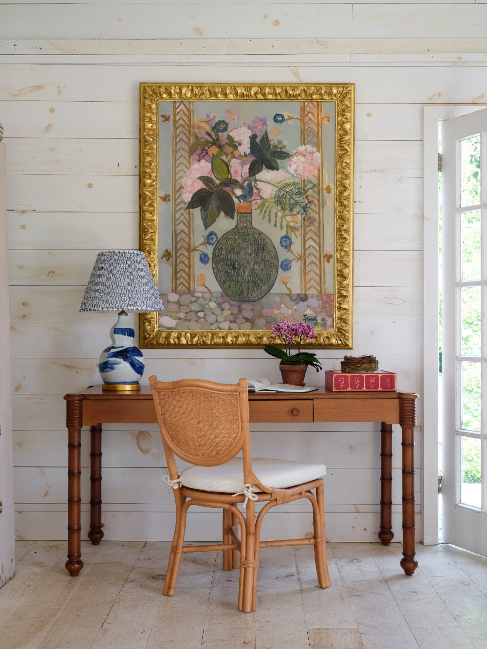 Hand-glazed ceramic lamp in a blue brush stroke glaze on a gold base by Bunny Williams Home