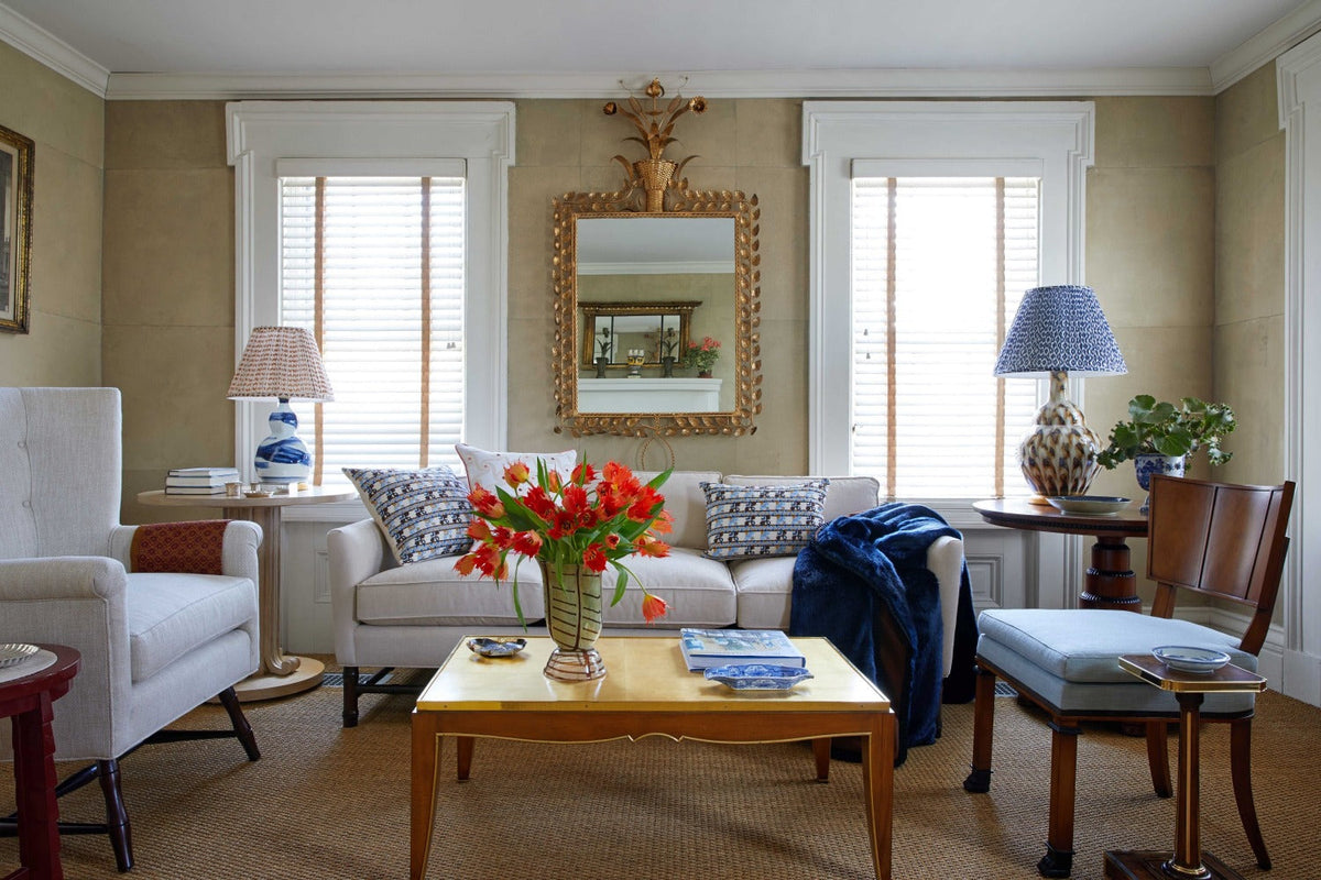 Hand-glazed ceramic lamp in a blue brush stroke glaze on a gold base by Bunny Williams Home