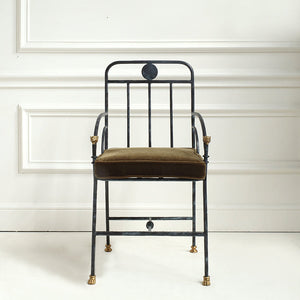 Decorative chair with metal frame and brown cushion on a white background