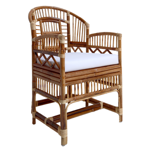 Wicker chair with a white cushion on a white background