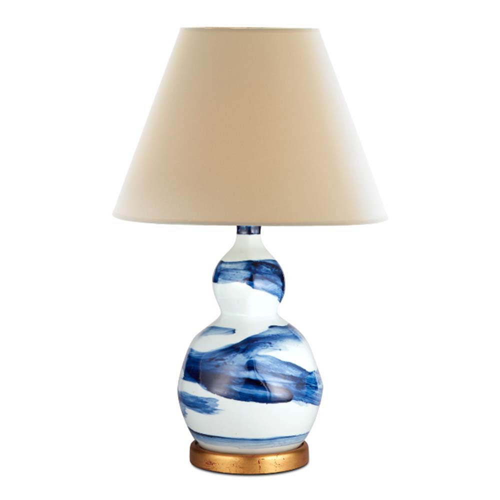 Hand-glazed ceramic lamp in a blue brush stroke glaze on a gold base by Bunny Williams Home
